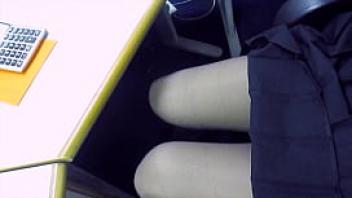 Flashing her stockings at work